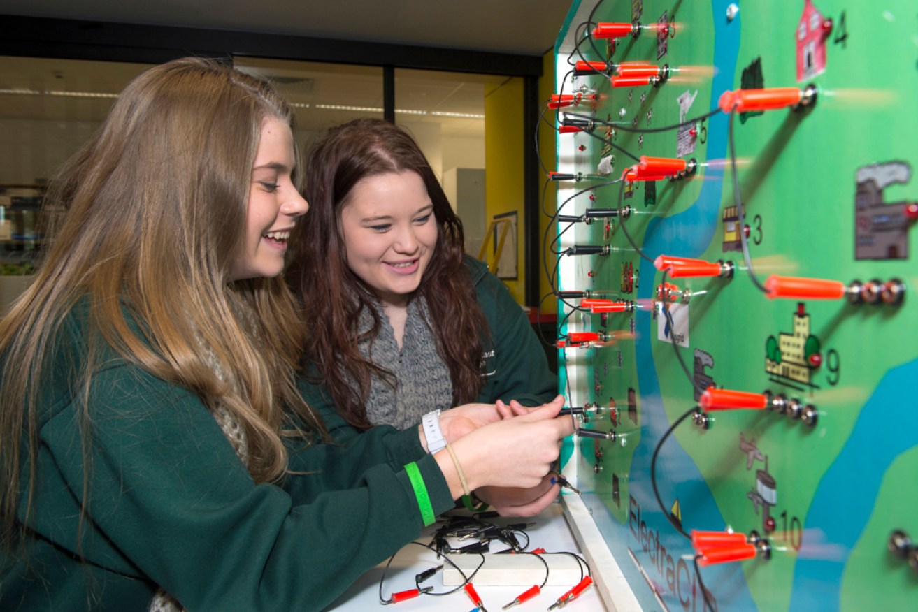 Connecting the grid: Sophie Stone (left) and Emma Kempster from Reynella High School.