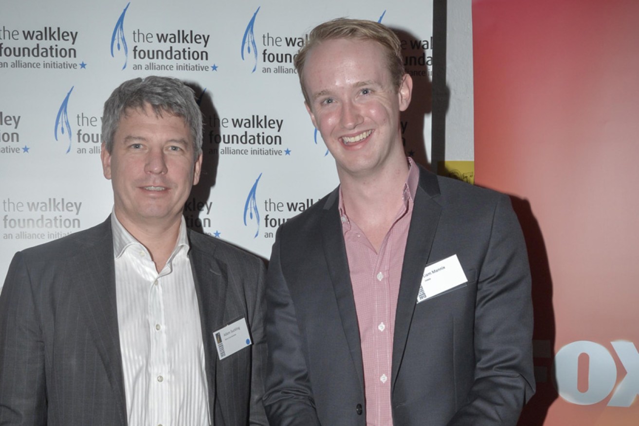InDaily's Liam Mannix (right) after receiving his award last night. Pictured with Adam Suckling, a representative of the category sponsor News Corp.