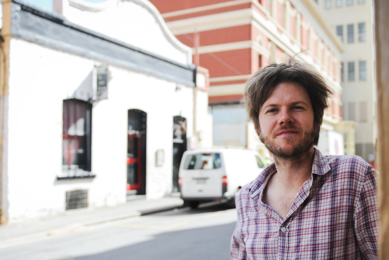 Zac Coligan outside the now-demolished old Jade Monkey venue. Photo: Nat Rogers/InDaily