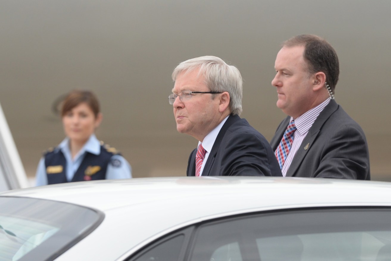 Prime Minister Kevin Rudd arrives at Fairbairn Airport in Canberra today. He was in Canberra for a second security briefing on the unfolding situation in Syria.