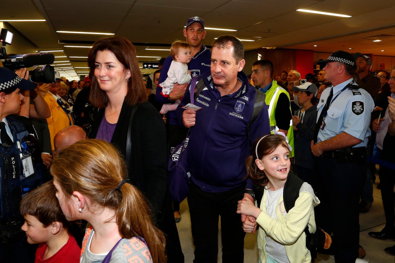 Ross Lyon and family leave Perth airport