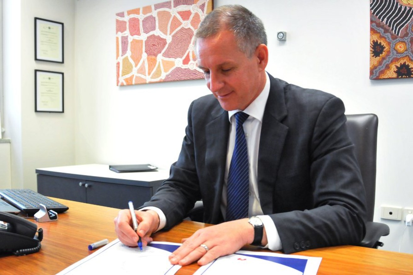 Premier Jay Weatherill signs the open data declaration this morning. 