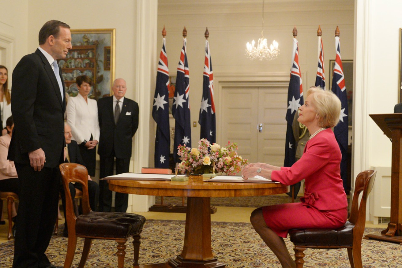 Tony Abbott is sworn in as Prime Minister by Governor-General Quentin Bryce at Government House as his family watches on.