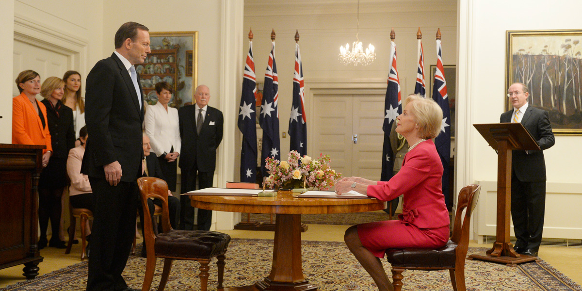 Tony Abbott is sworn in as Prime Minister by Governor-General Quentin Bryce at Government House as his family watches on.