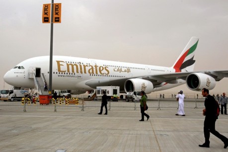 Emirates cuts US flights, blaming Trump