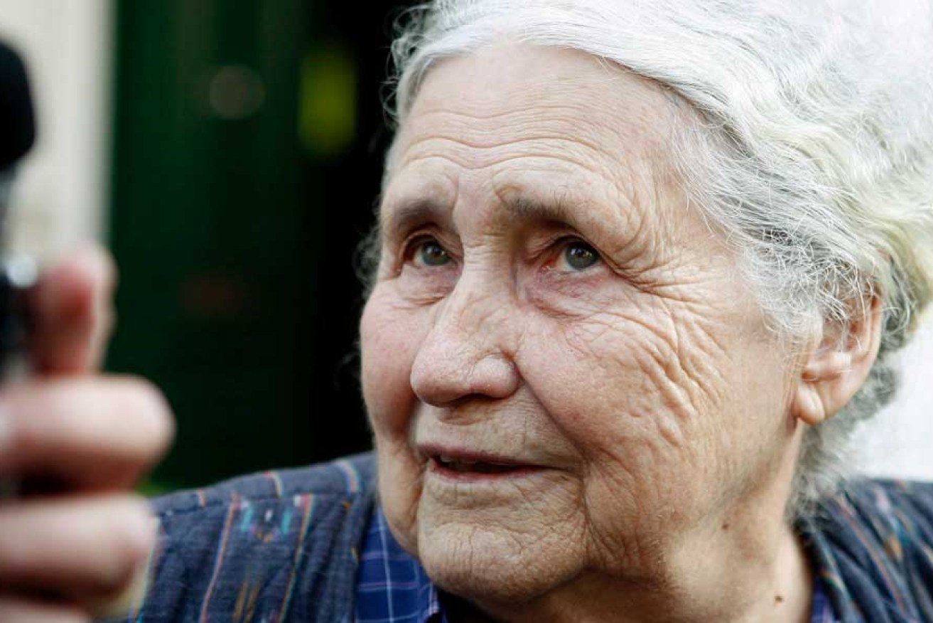 Doris Lessing talks to the media outside of her London home in 2007.