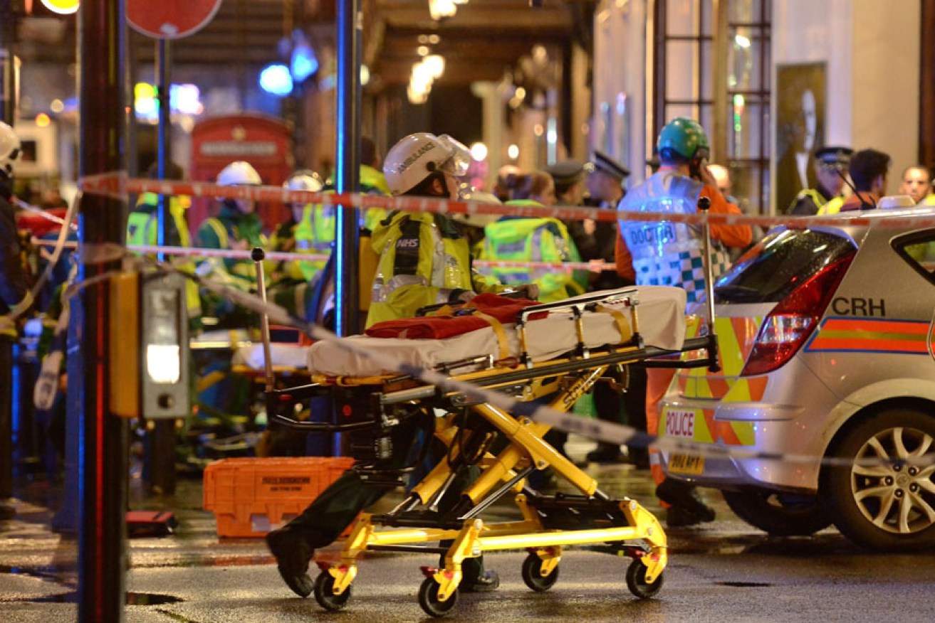 Emergency services attending the scene at the Apollo Theatre in central London.