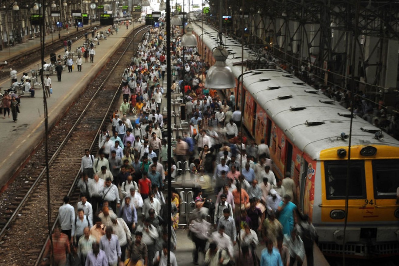 Indian commuters in Mumbai. Population rates are predicted to steady or decline.