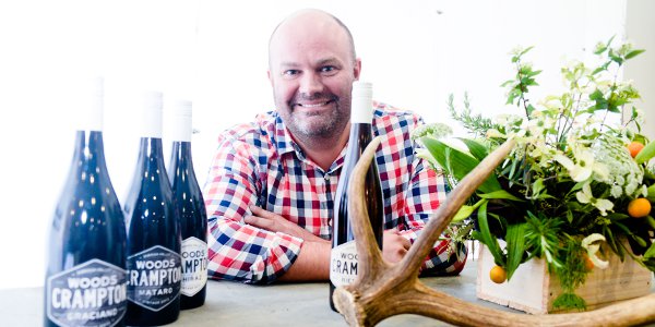Woodscannon director Aaron Woods with his wine range. Photo: Nat Rogers / InDaily