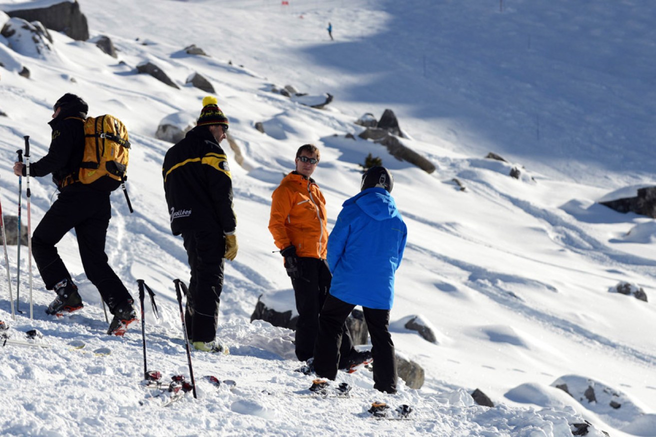 Resort officials near where Michael Schumacher had an accident at the French Alps ski resort of Meribel. Photo: AFP
