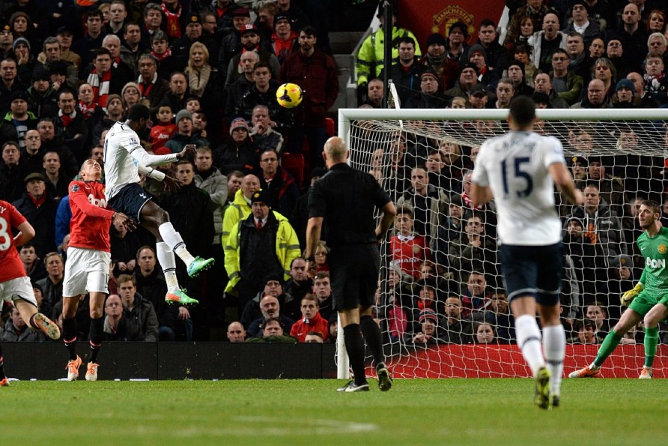 Tottenham Hotspur's Emmanuel Adebayor scores his team's opening goal.