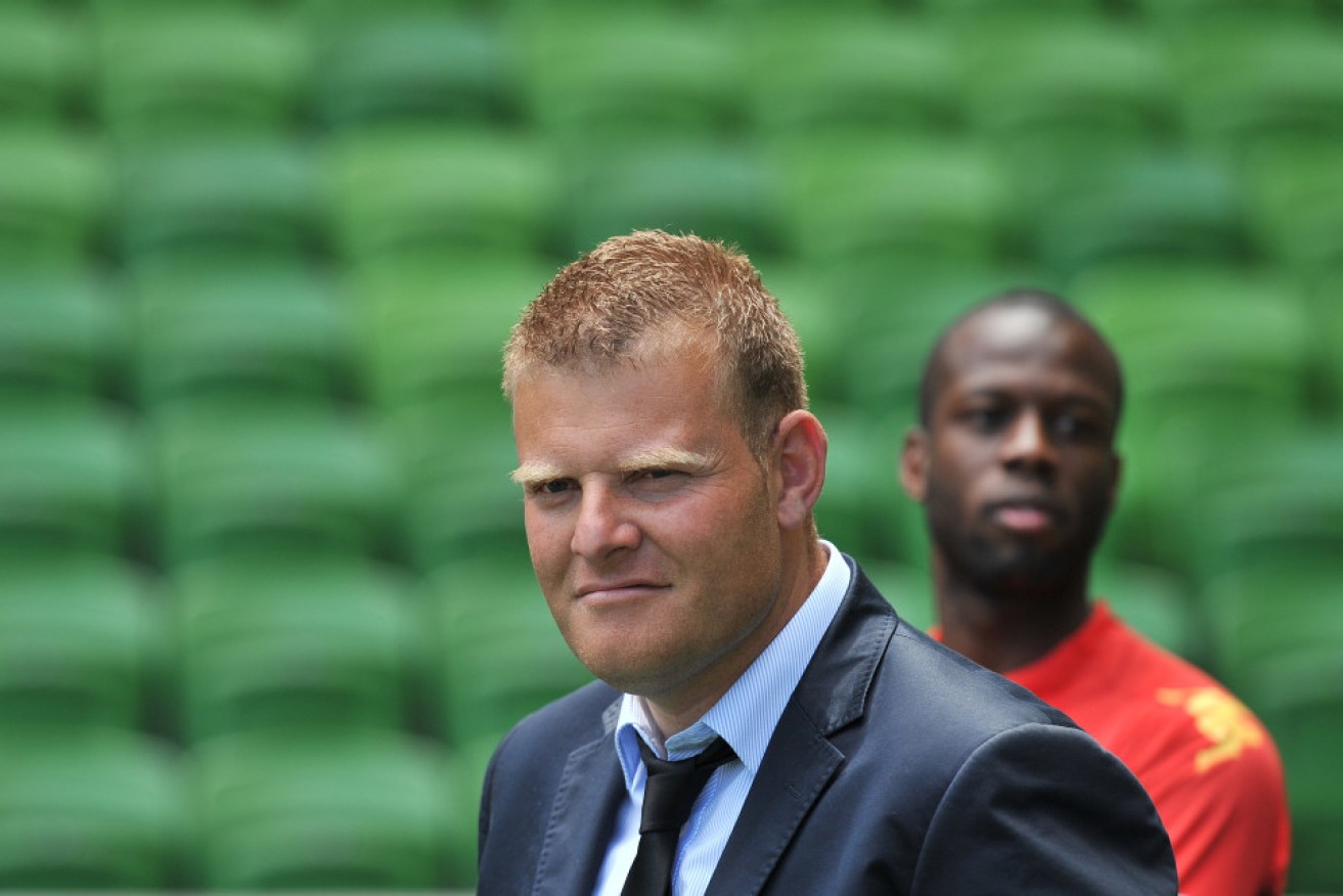 Coach Josep Gombau with Bruce Djite  in the background