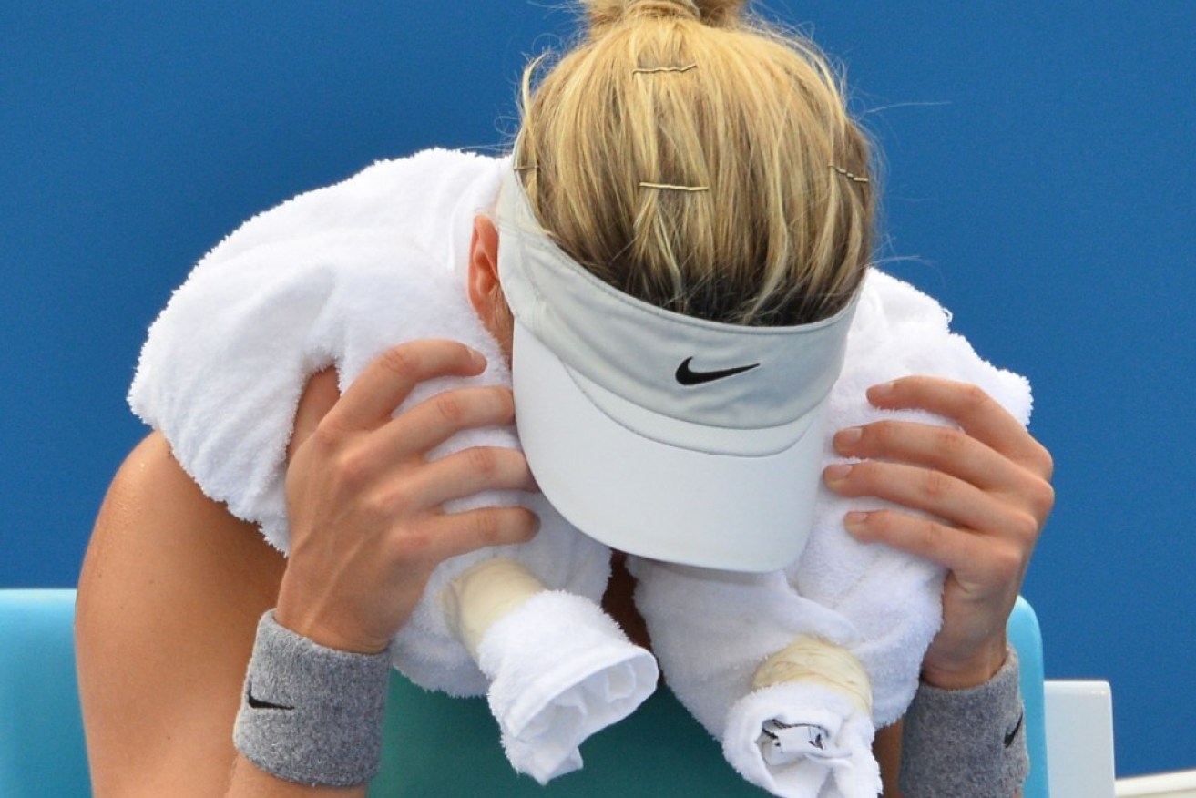 Canada's Eugenie Bouchard with an ice towel