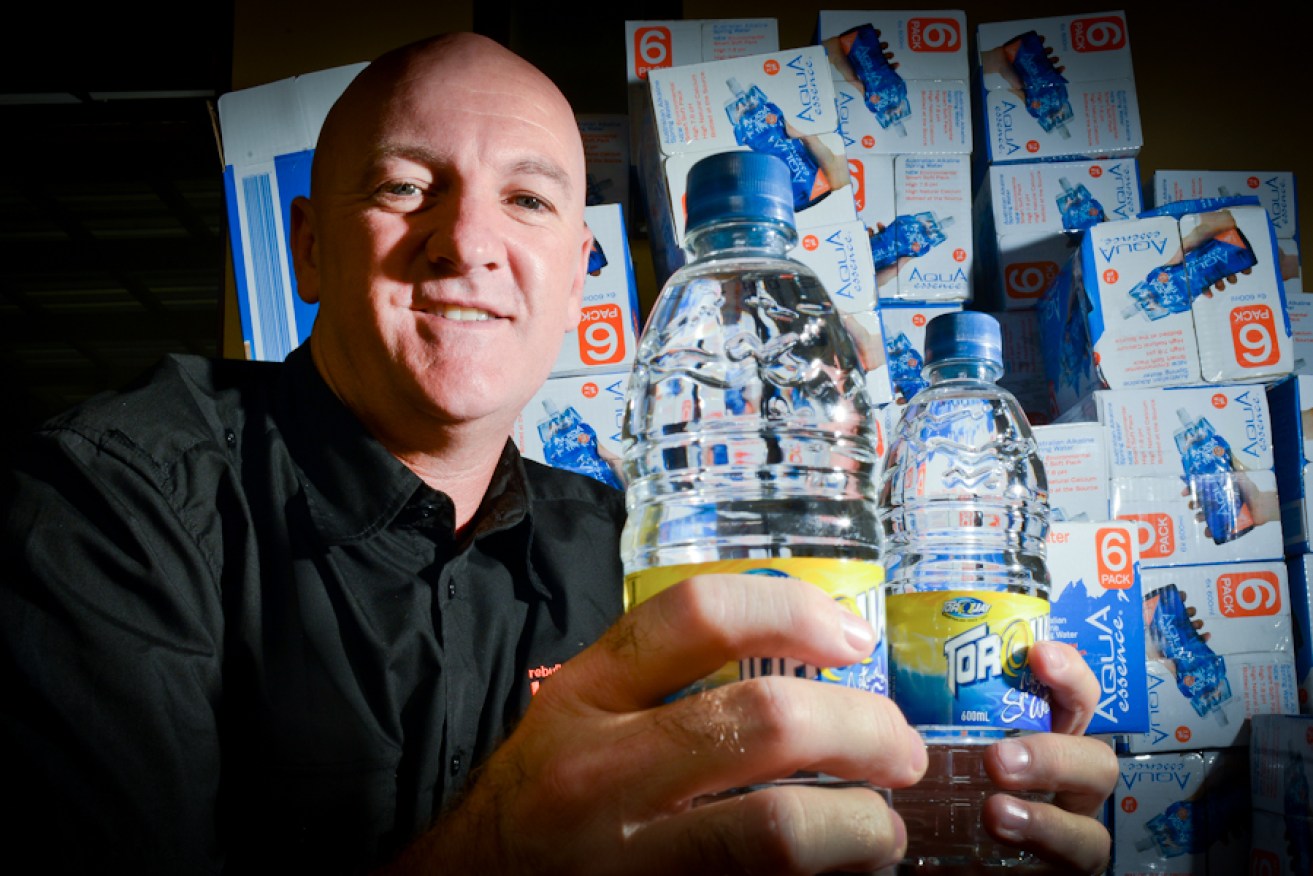 Ian Cox and his donation. Photo: Nat Rogers / InDaily
