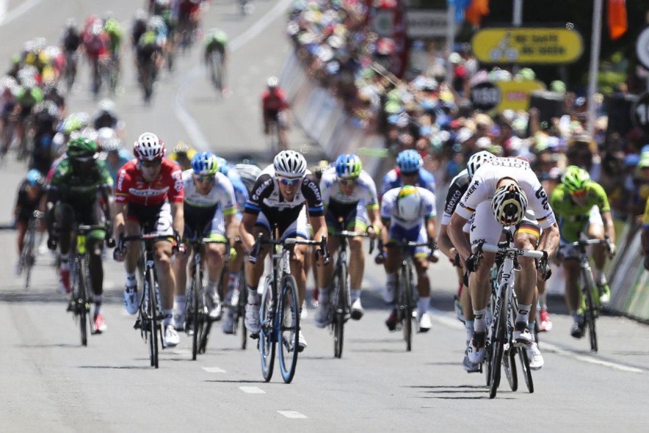Jan 26, 2014: Andre Greipel from Germany sprints for the finishing line during stage 6 of the 2014 Tour Down Under. Photo: AAP
