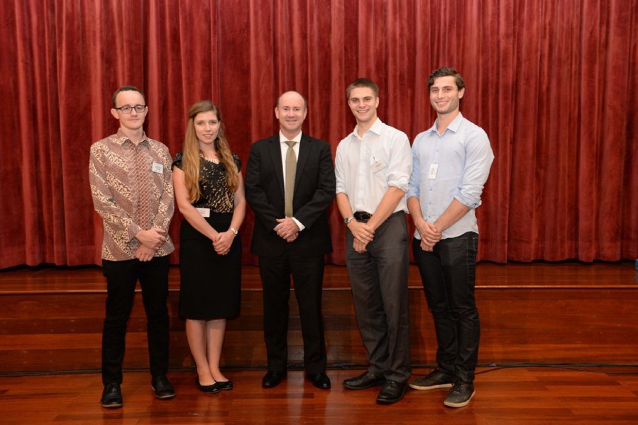 James Baker, fourth from left, with Australian Ambassador Greg Moriarty and other students.  