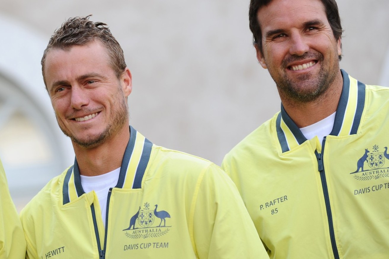 Lleyton Hewitt with previous Davis Cup captain Pat Rafter.