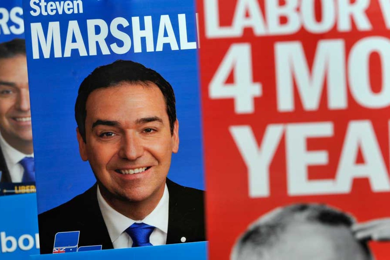 Election posters outside the East Adelaide Primary School polling booth in Steven Marshall's seat of Dunstan on Saturday.