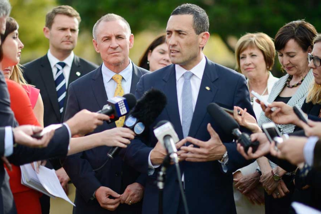 Premier Jay Weatherill stands behind his new Treasurer Tom Koutsantonis at Government House last week. Photo: Nat Rogers/InDaily