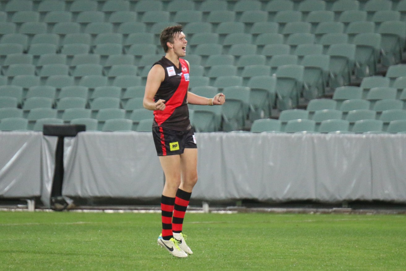 Jesse Watchman watches his first goal at Adelaide Oval. Image by Peter Argent