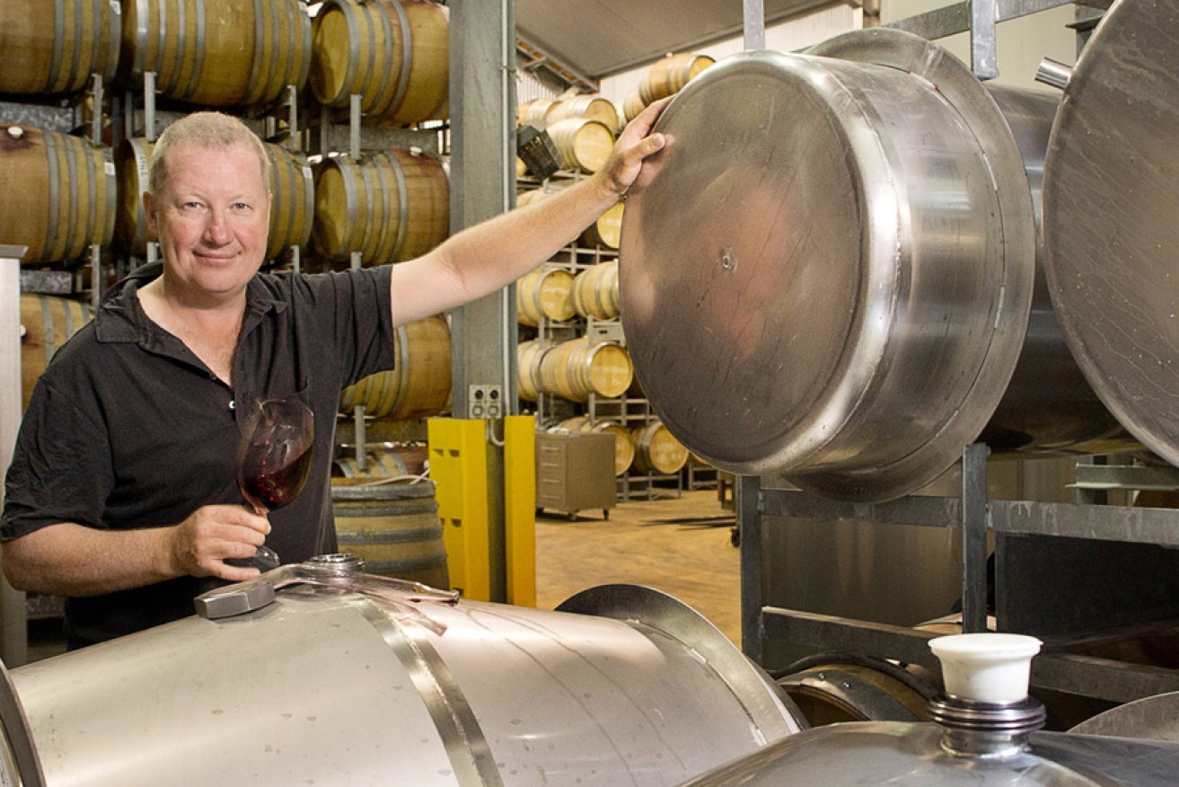 Michael Twelftree with his barrel-sized stainless-steel Grenache containers. Photo: www.donbrice.com