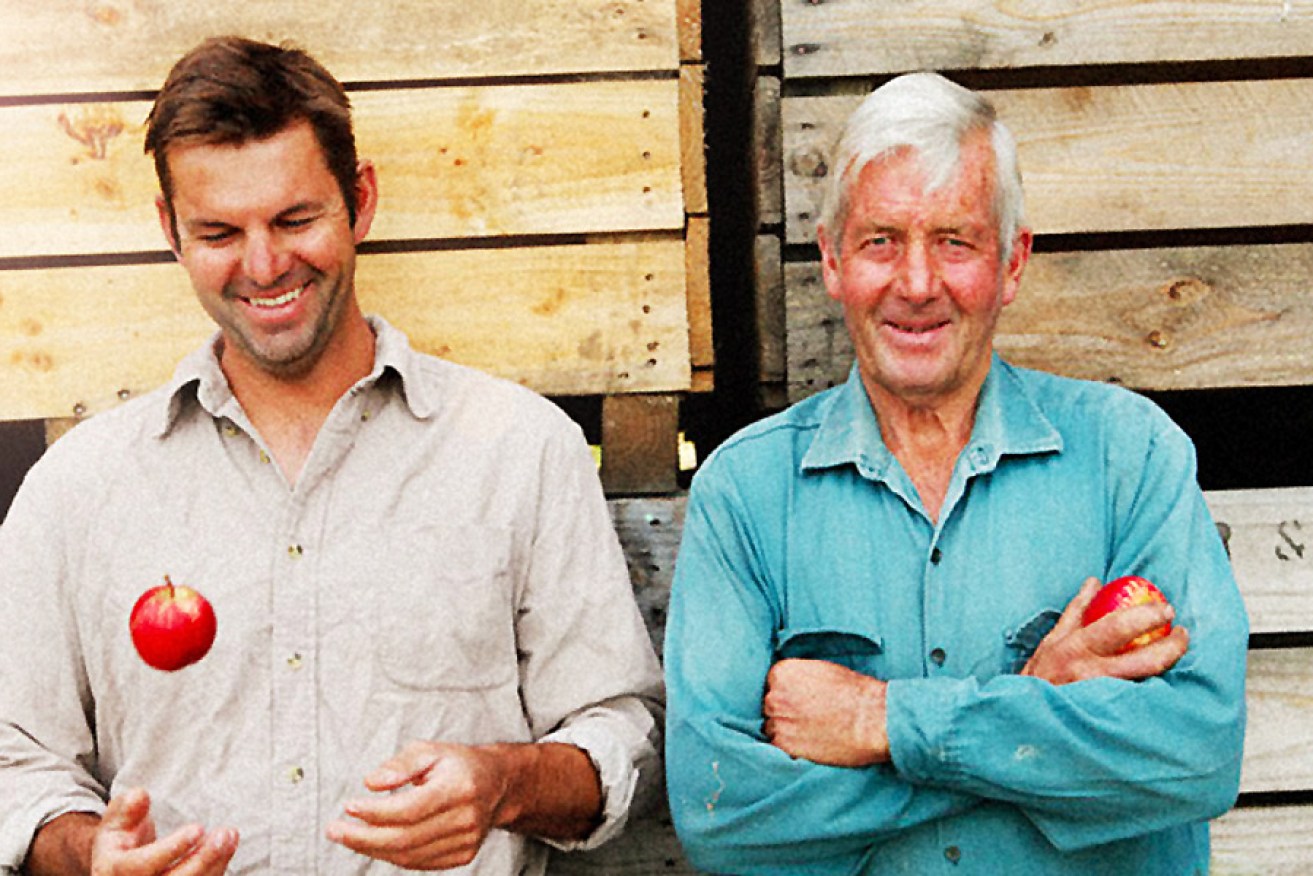 Andrew and Ian Smith, fourth and third-generation apple growers in Tasmania's Huon Valley. Photo: Ali Nasseri
