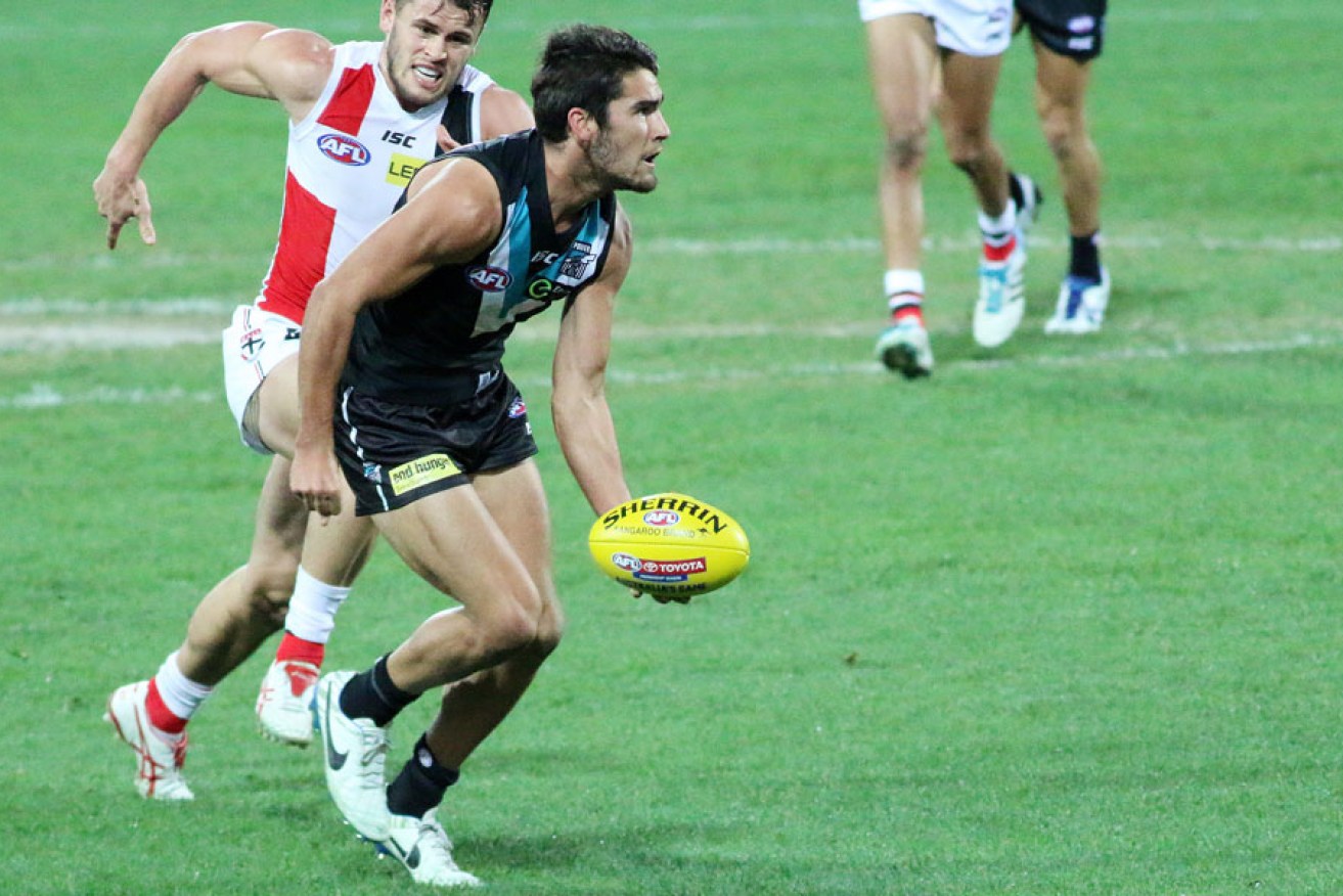 Chad Wingard did good work at ground level, as well as in the heavens. Scroll down for pictures of his extraordinary mark. Photos: Peter Argent
