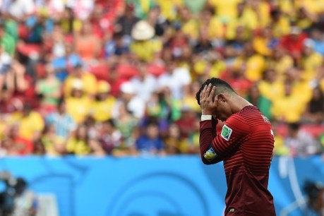 Portugal out, Suarez banned