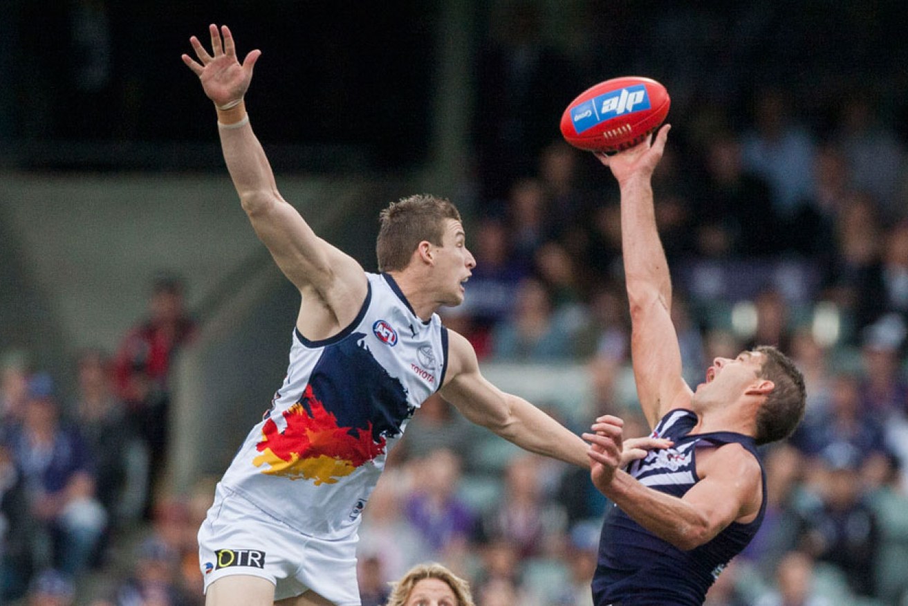 Aaron Sandilands in the process of comprehensively pantsing the Crows on the weekend.