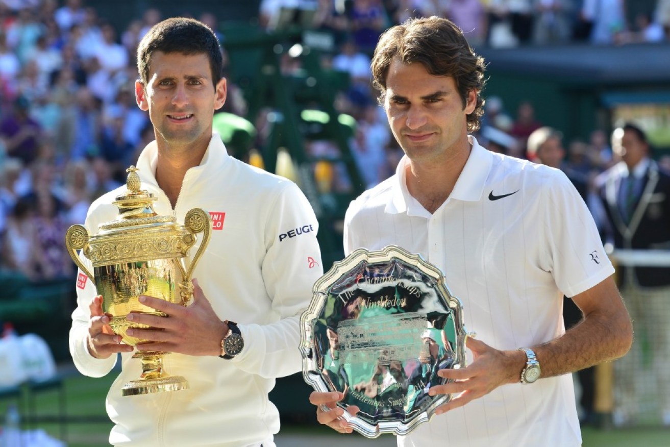 Winner Serbia's Novak Djokovic (L) and runner-up Switzerland's Roger Federer