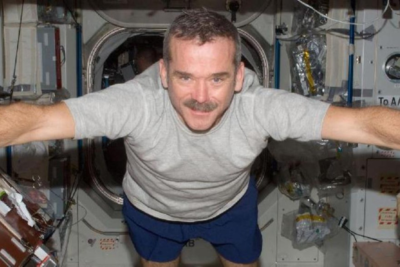 Chris Hadfield spent nearly five months on the International Space Station. Image from The Conversation.