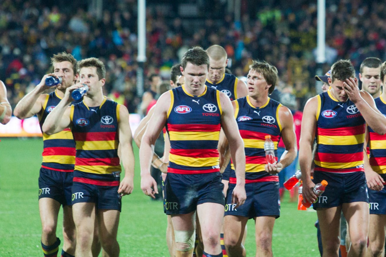 Disappointed Crows trudge off Adelaide Oval after yet another disappointing loss. 
