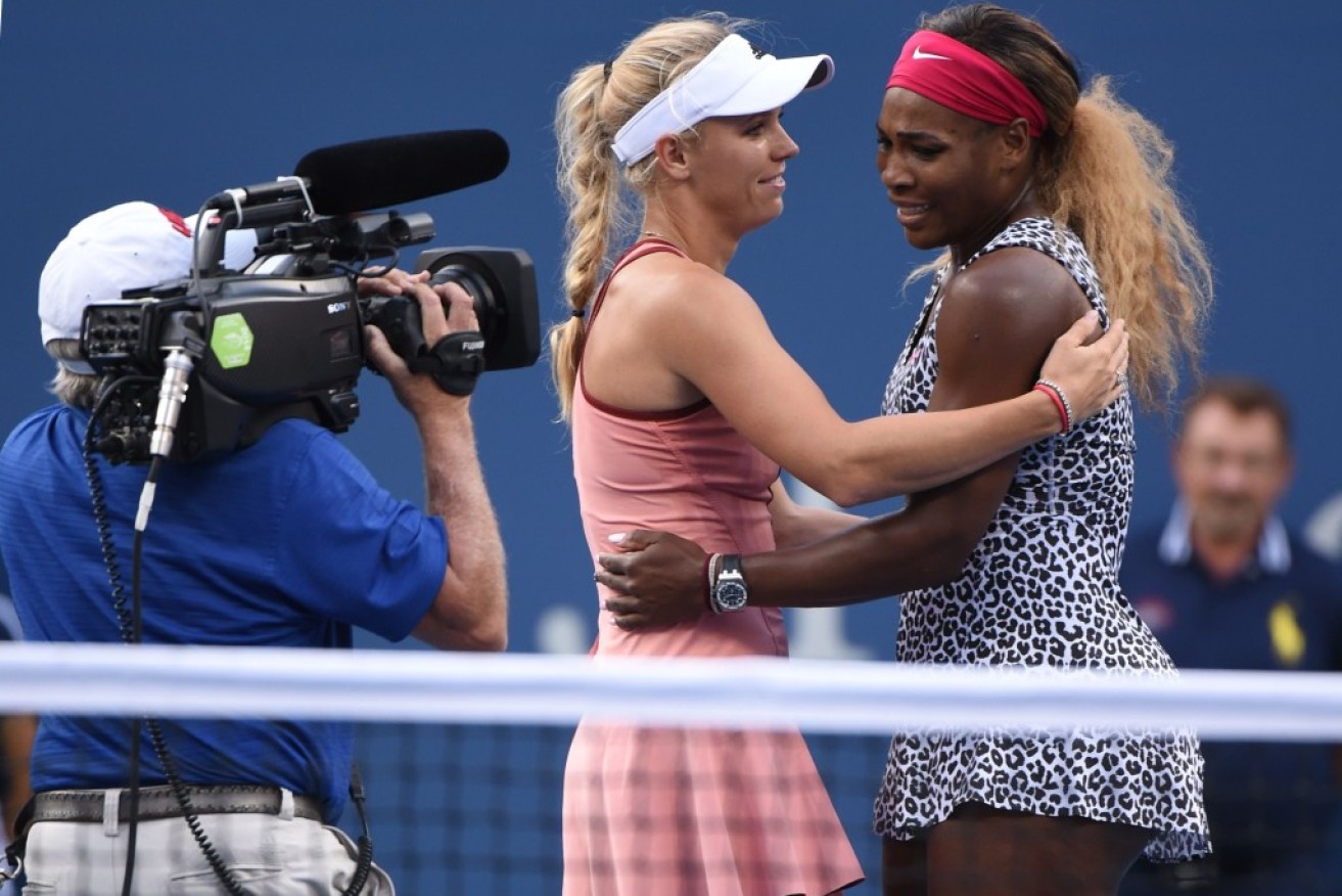 Wozniacki (left) congratulates Serena on her sixth US Open Crown