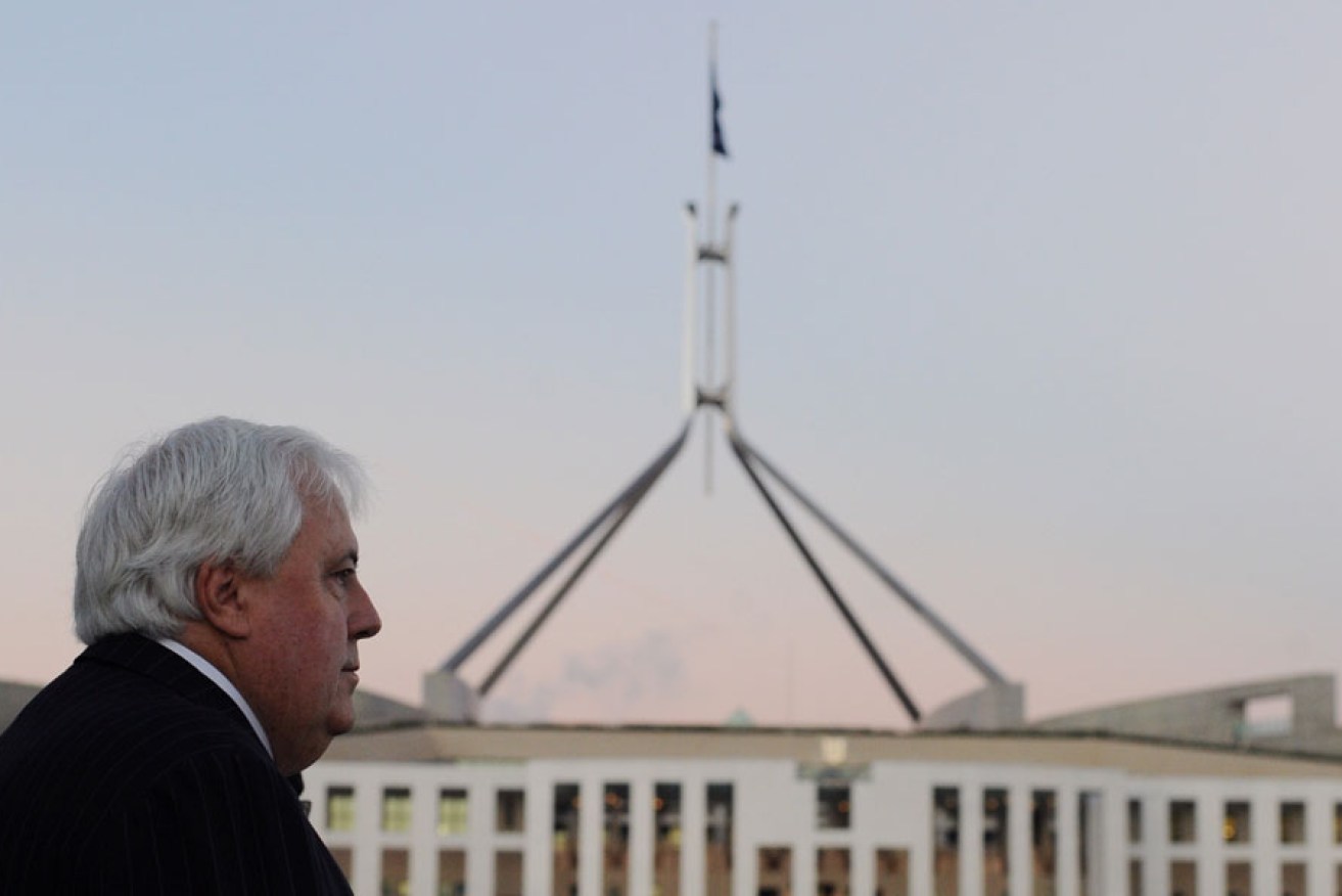 Clive Palmer eventually played ball on the mining tax - but at a price.