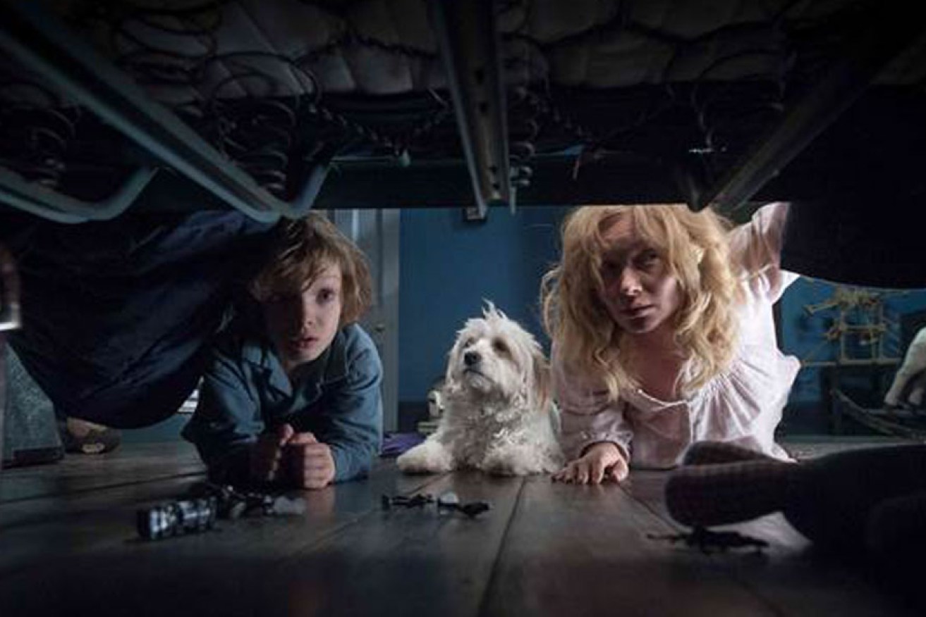 Essie Davis (right) with co-star Noah Wiseman in a scene from locally-produced film The Babadook.