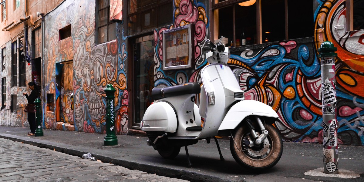 A scooter parked on the footpath in Melbourne's Hosier Lane. Advocates say Adelaide should follow the Victorian example.