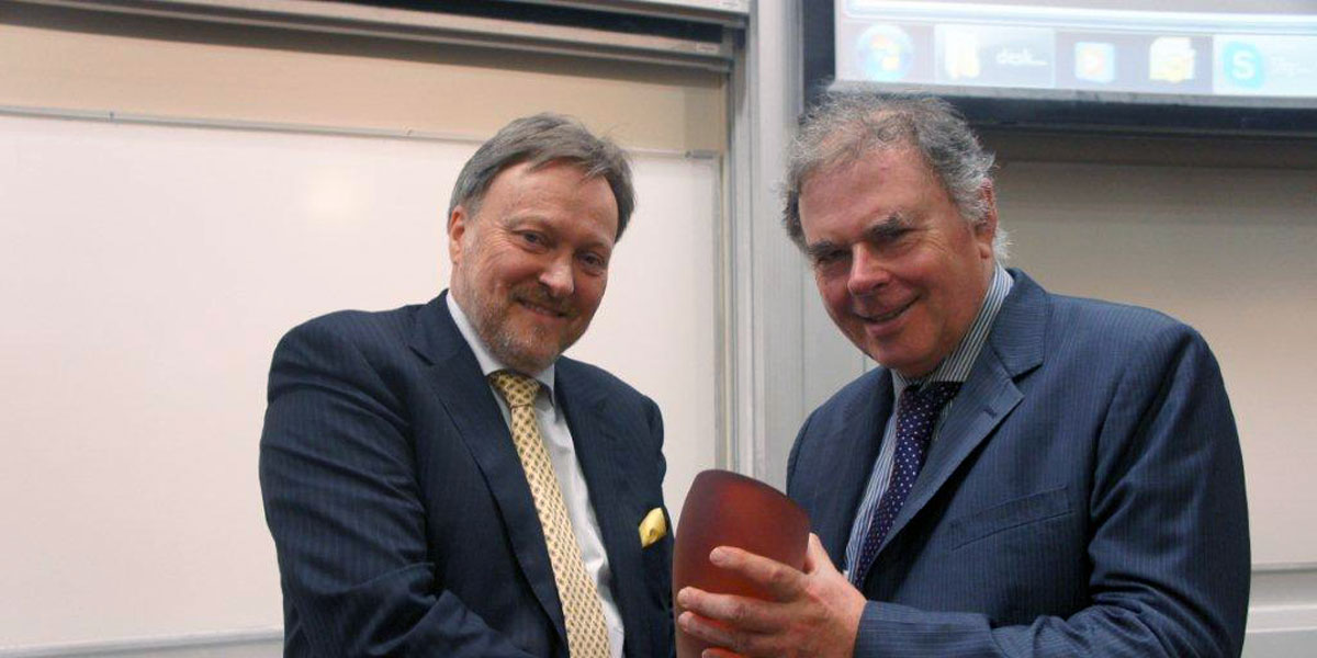 Crawford (right) with University of Adelaide Vice-Chancellor Warren Bebbington in 2013. Photo: University of Adelaide