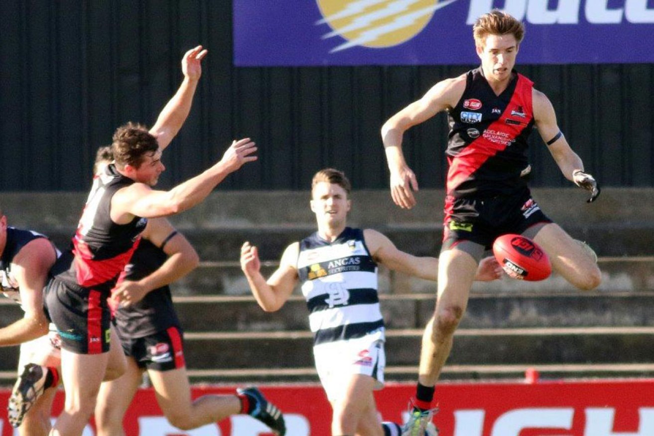 Sam Durdin (right) in action for West Adelaide. Photo: Peter Argent