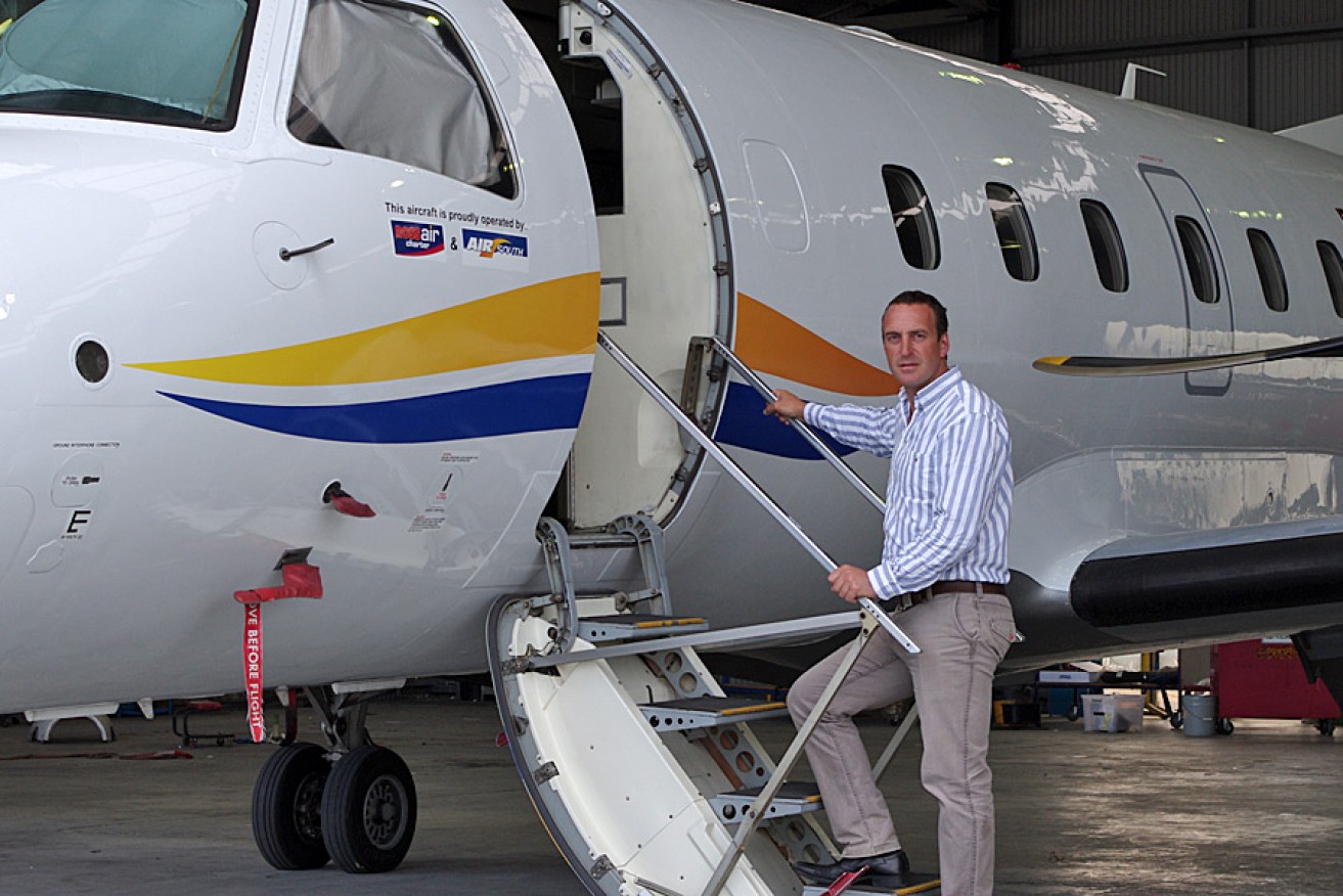 Air South director Mark Lindh with the new Embraer Brasilia 120.