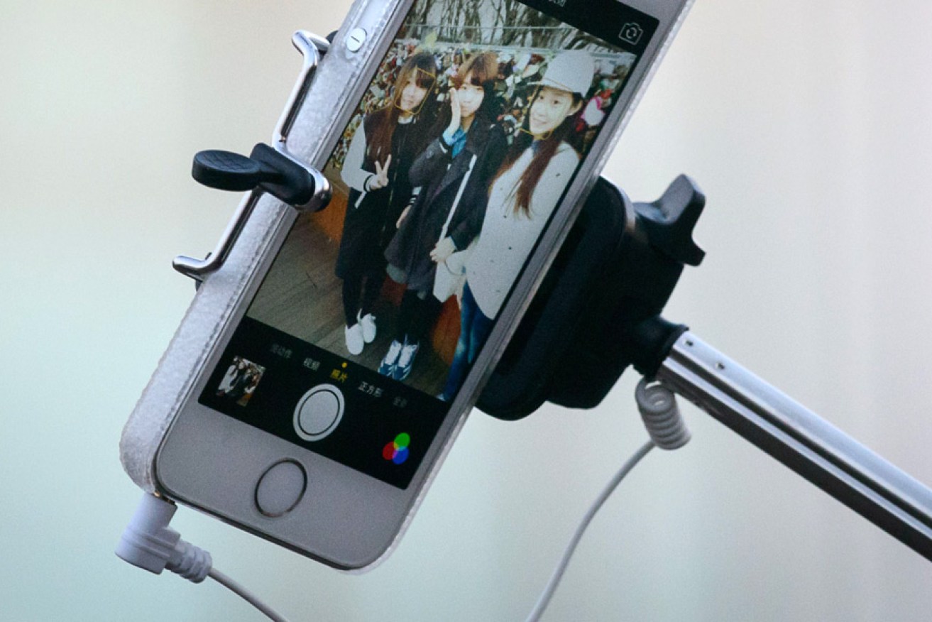 The selfie stick is the is the top gift for Christmas 2014, according to Citi. Photo: AAP