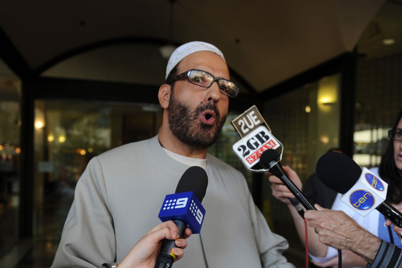A 2011 file image of Sheikh Man Haron Monis being questioned by the media.