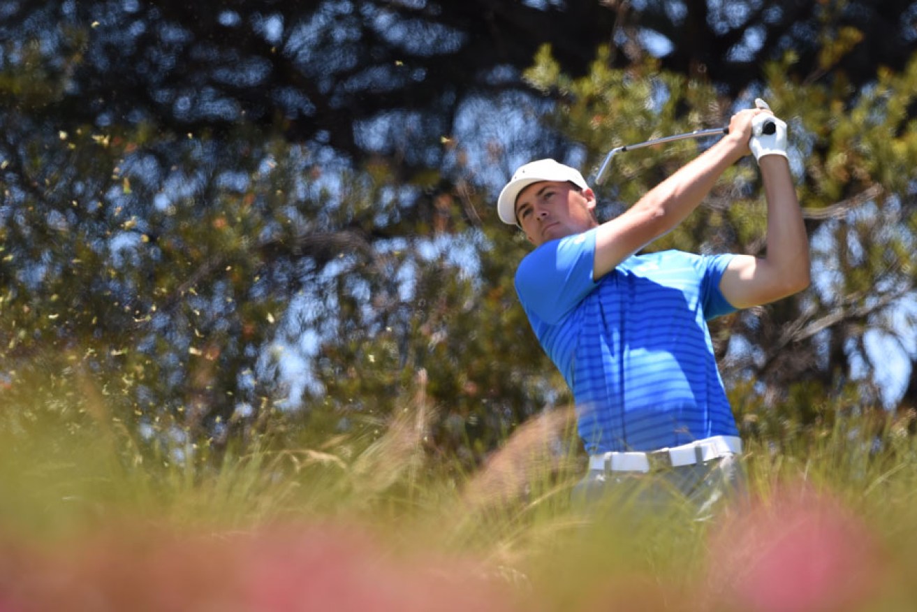 Jordan Spieth of the USA tees off on the 2nd during the final round of the Australian Open.