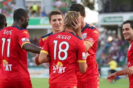 Hot Reds defeat leaders