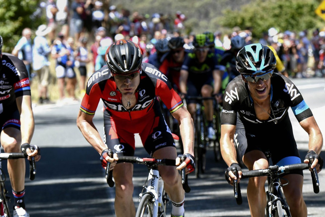 Richie Porte (right) leads Cadel Evans during the final climb of stage three yesterday.