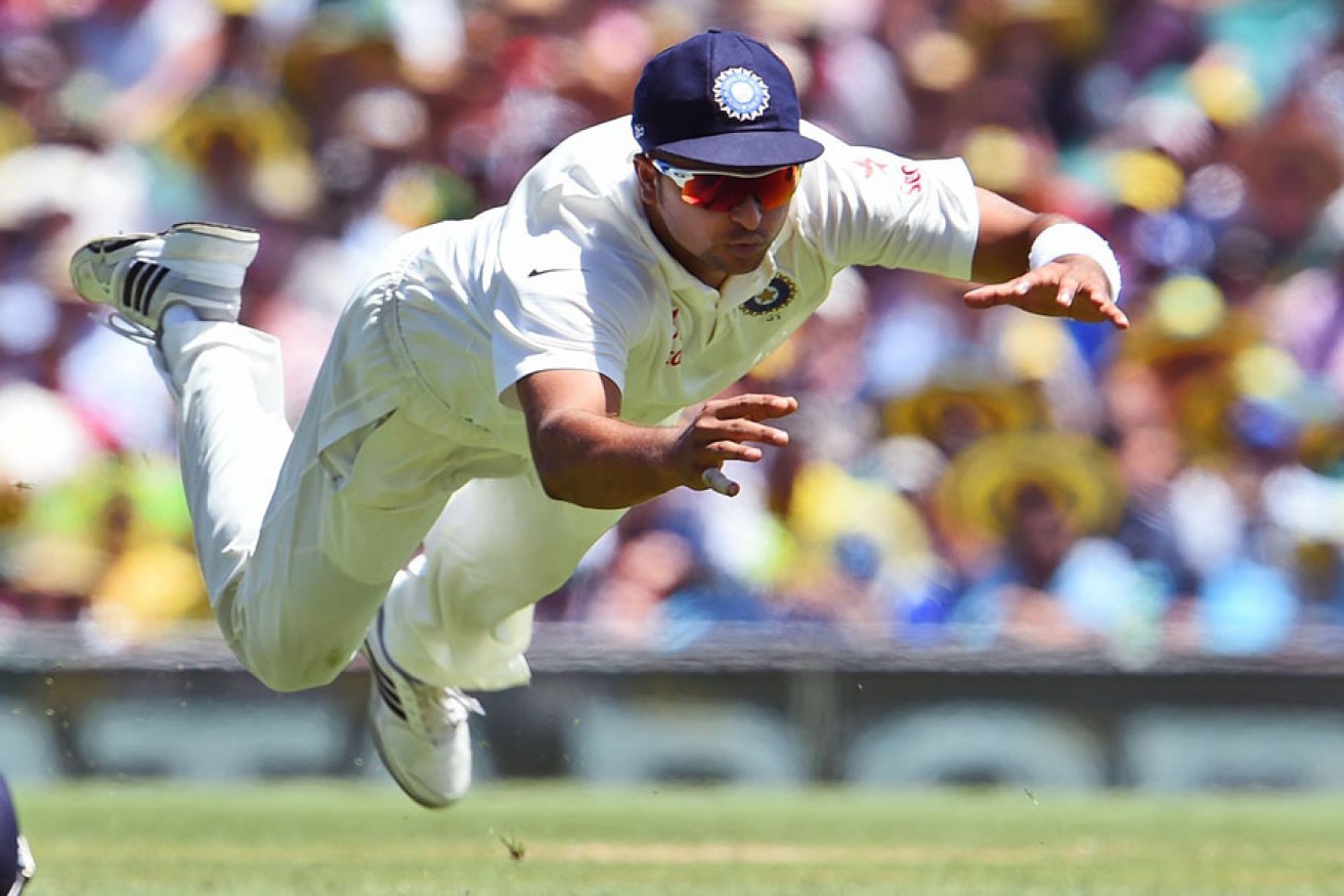 India's Suresh Raina drops a catch from Australian batsman Chris Rogers on the first day of the SCG Test.