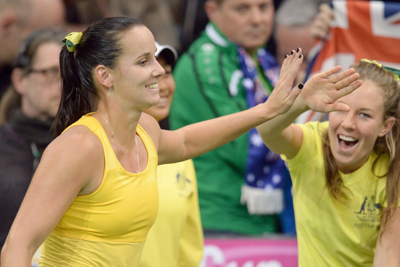 Jarmila Gajdosova (left) celebrates her victory against Germany's Angelique Kerber.