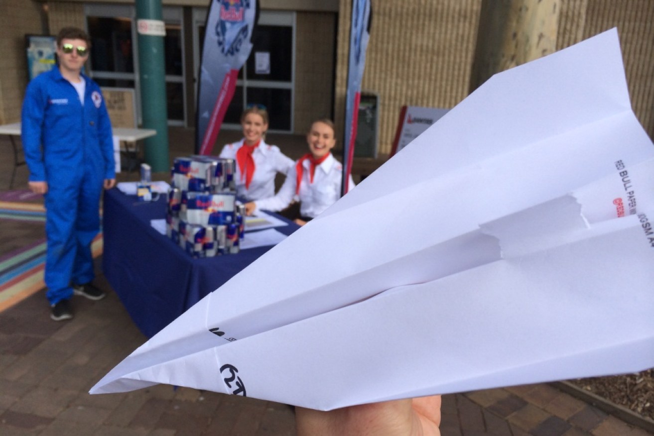 Hundreds of Flinders University students showed off their paper plane making skills last week to try to win a trip to Austria as part of Red Bull's Paper Wings competition. Photo: Grant Smyth