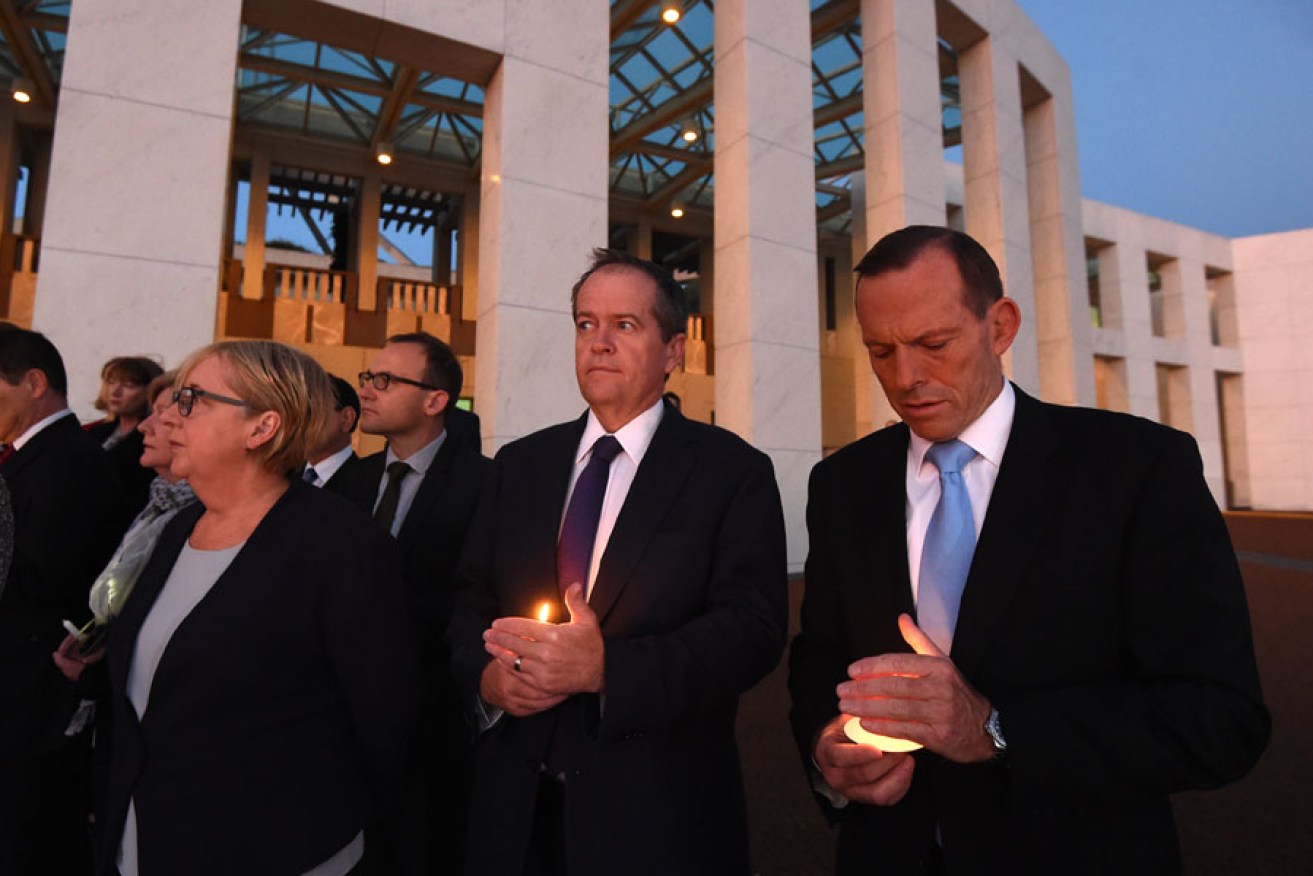 Tony Abbott (right) and Bill Shorten at a candlelight vigil for Andrew Chan and Myuran Sukumaran.