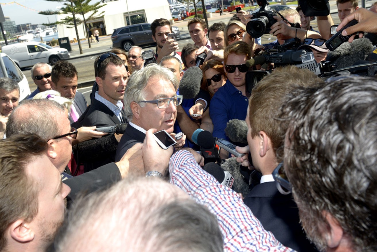 Essendon's lawyer David Grace QC speaks to media at AFL headquarters. Photo: AAP