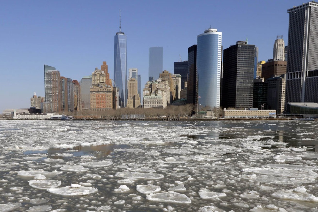 A view of Lower Manhattan from the Staten Island Ferry as the New York Harbor is filled with large chunks of ice.